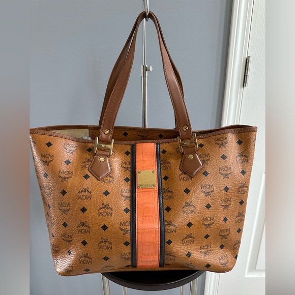 MCM Handbags - MCM Visetos Rudic Shopper Tote Cognac Orange Stripe - Authentic